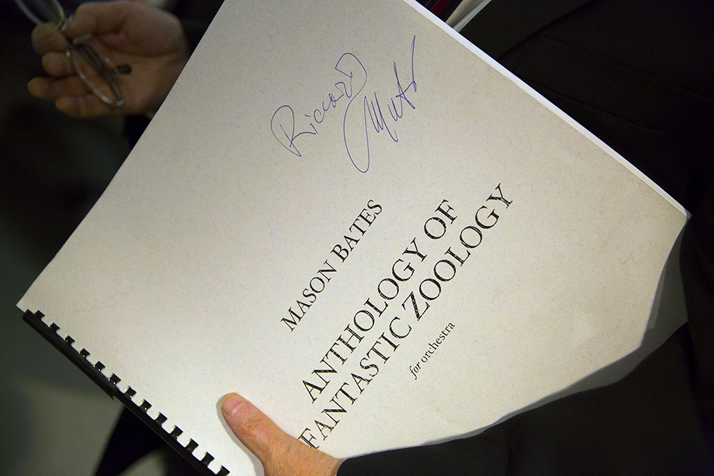 Maestro Muti holds a copy of the score for Mason Bates' Anthology of Fantastic Zoology. | © Todd Rosenberg Photography 2015