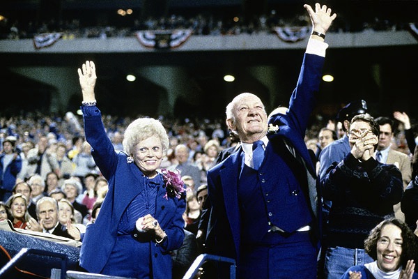 My place or yours? Kansas City philanthropists Ewing and Muriel Kauffman wave to fans at the ballpark.