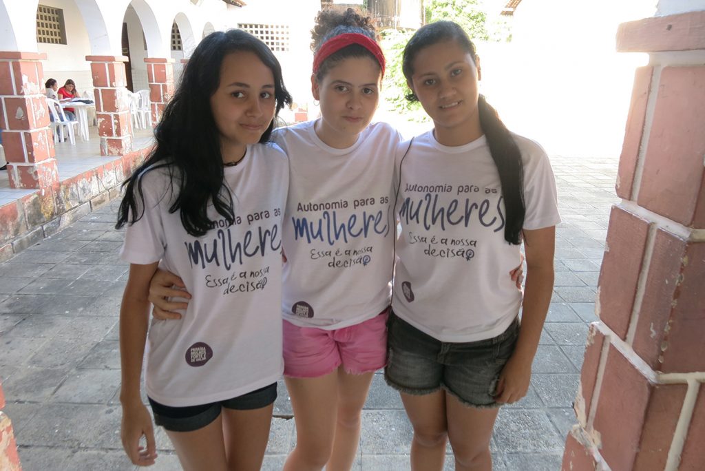 PRIMA percussionists (from left) Aline, Maria Clara, and Thamyres wear T-shirts that with the slogan “Autonomy for women — that’s our choice.” | Photo: Andrew Huckman