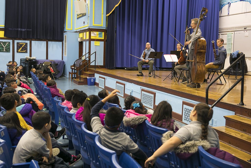 CSO bassist Daniel Armstrong fields questions from students at Sawyer Elementary School during a Negaunee Music Institute-sponsored event in December. | © Todd Rosenberg Photography 2016