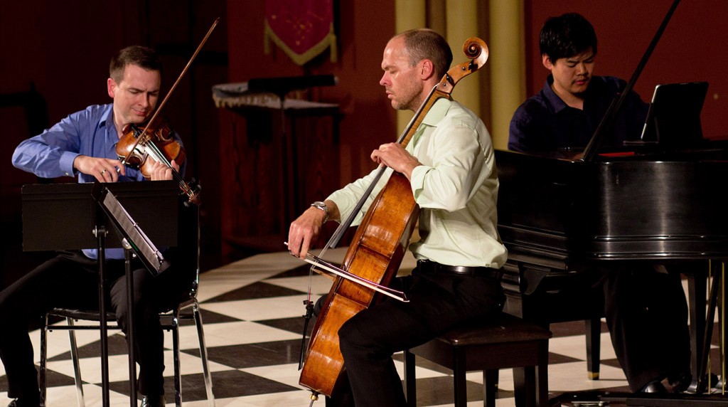 CSO cellist Brant Taylor (center), with violinist John Macfarlane and pianist Winston Choi at a Rush Hour Concerts performance in 2014. | Photo by Elliot Mandel 