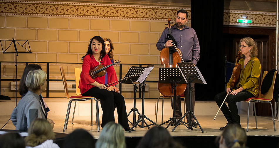 CSO musicians Yuan-Qing Yu, Gina DiBello, Ken Olsen and Diane Mues take questions after a performance at the Akademisches Gymnasium Wien. | © Todd Rosenberg Photography 2017