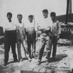 Photograph of Five Ward brothers at Edwards & Ward Stone and Granite Works, ca. 1915